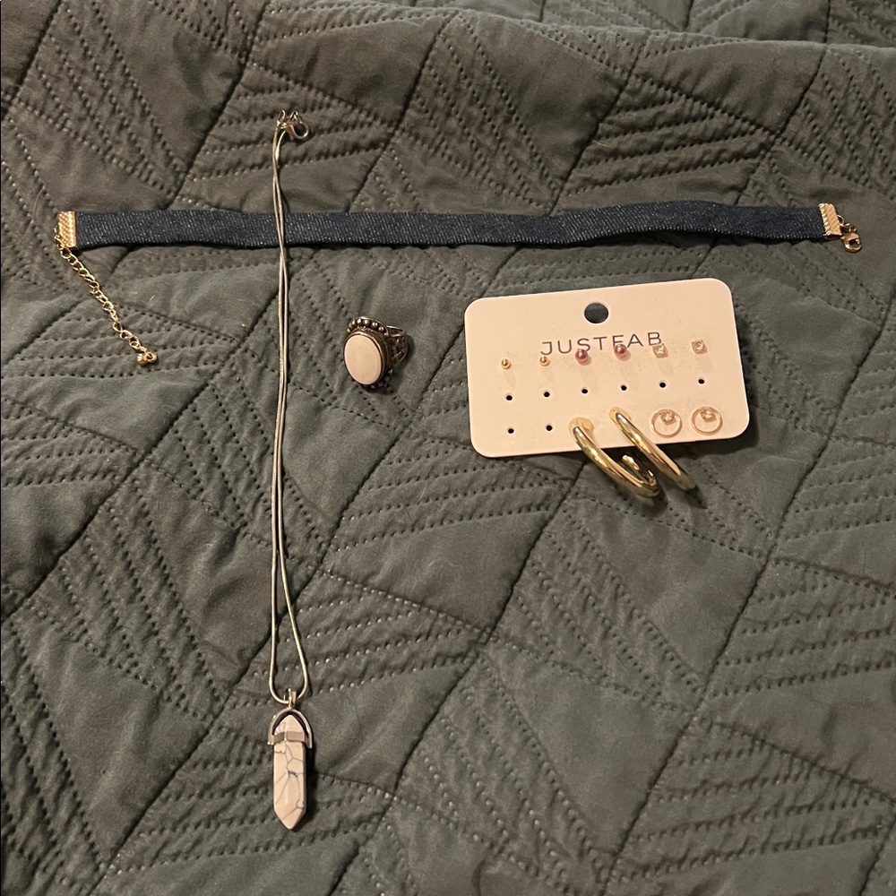Assorted Jewelry: Choker, Necklace, earrings and rings.